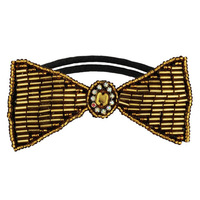 Dolorosa Hair Elastic Gold (© TASSEL) Dolorosa Hair Elastic Gold: (© TASSEL)